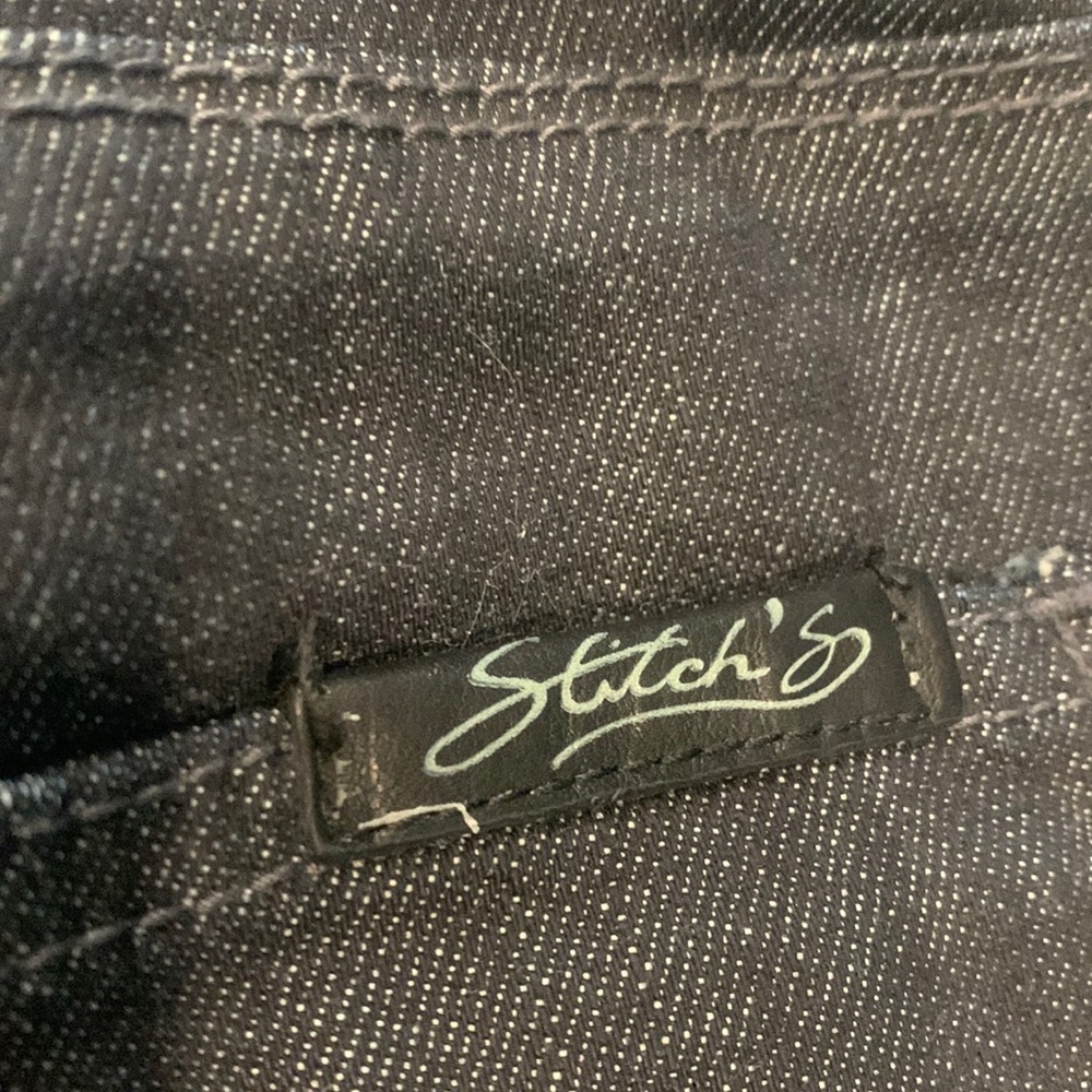 Stitches straight leg jean, long inseam.